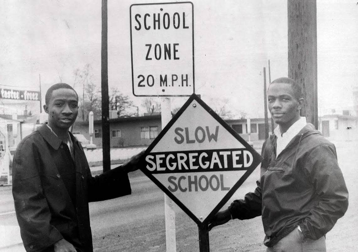 Wallace Webster, left, and Larry Avery protested what the de facto segregation at Whittier School in east Pasco in 1964. The posted the segregated school sign in front of the Lewis Street school.