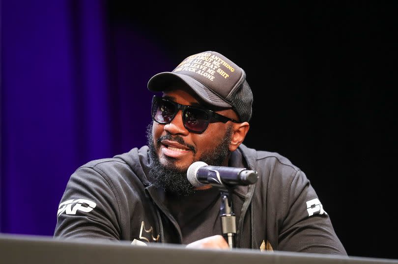 Malik Scott speaks during a press conference