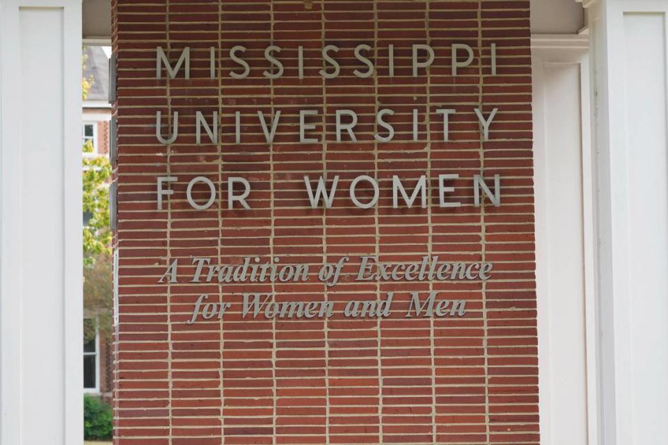 A covered bench at the Mississippi University for Women denotes the coed student body makeup of the Columbus campus.
