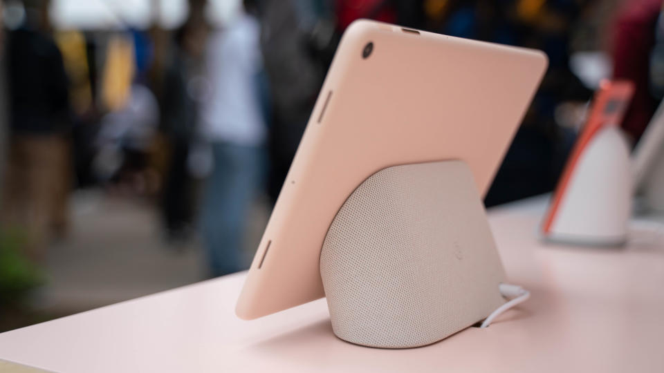 A Coral Google Pixel Tablet at Google I/O on its dock