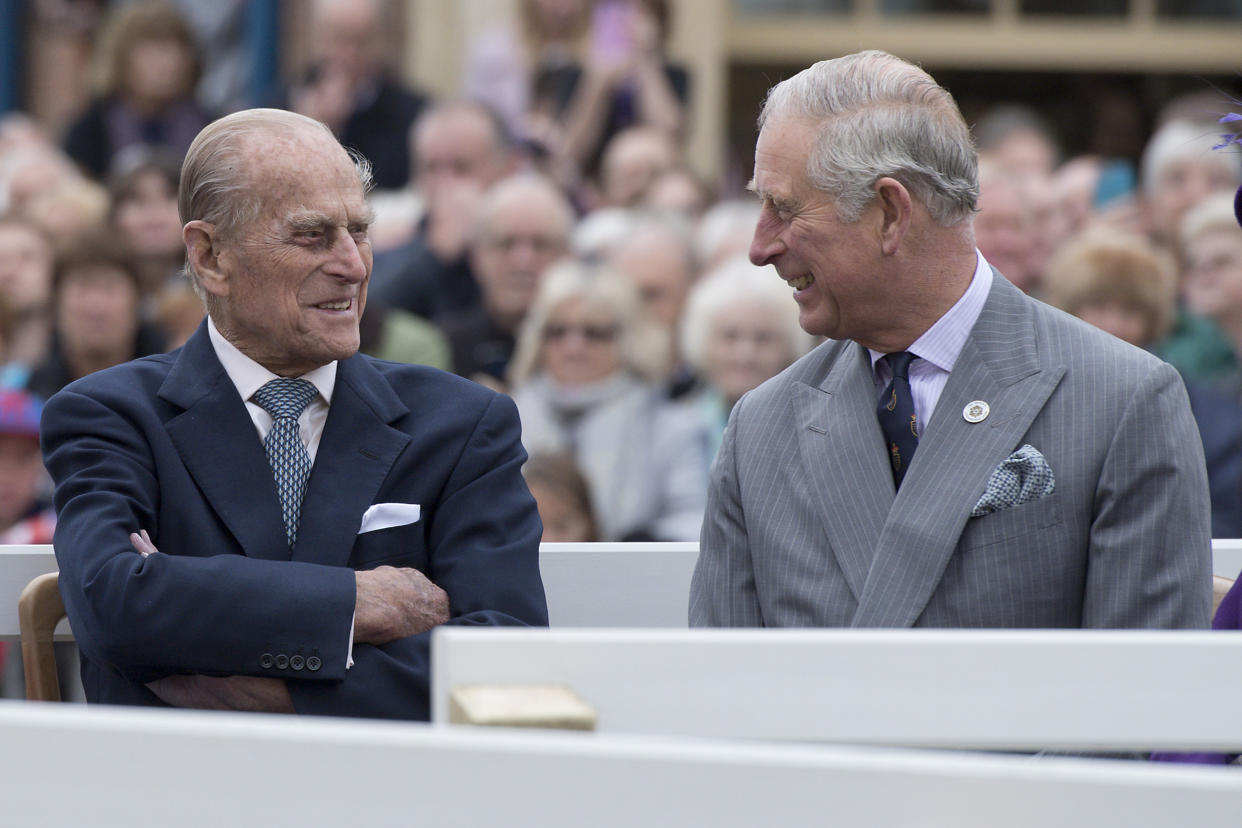 POUNDBURY, ENGLAND - OCTOBER 27: Britain's Prince Philip, Duke of Edinburgh (L) and Prince Charles, Prince of Wales (R) listen to speeches before a statue of the Queen Elizabeth, The Queen Mother was unveiled on October 27, 2016 in Poundbury, England.
The Queen and The Duke of Edinburgh, accompanied by The Prince of Wales and The Duchess of Cornwall, visited Poundbury. Poundbury is an experimental new town on the outskirts of Dorchester in southwest England designed by Leon Krier with traditional urban principles championed by The Prince of Wales and built on land owned by the Duchy of Cornwall.(Photo by Justin Tallis - WPA Pool/Getty Images)