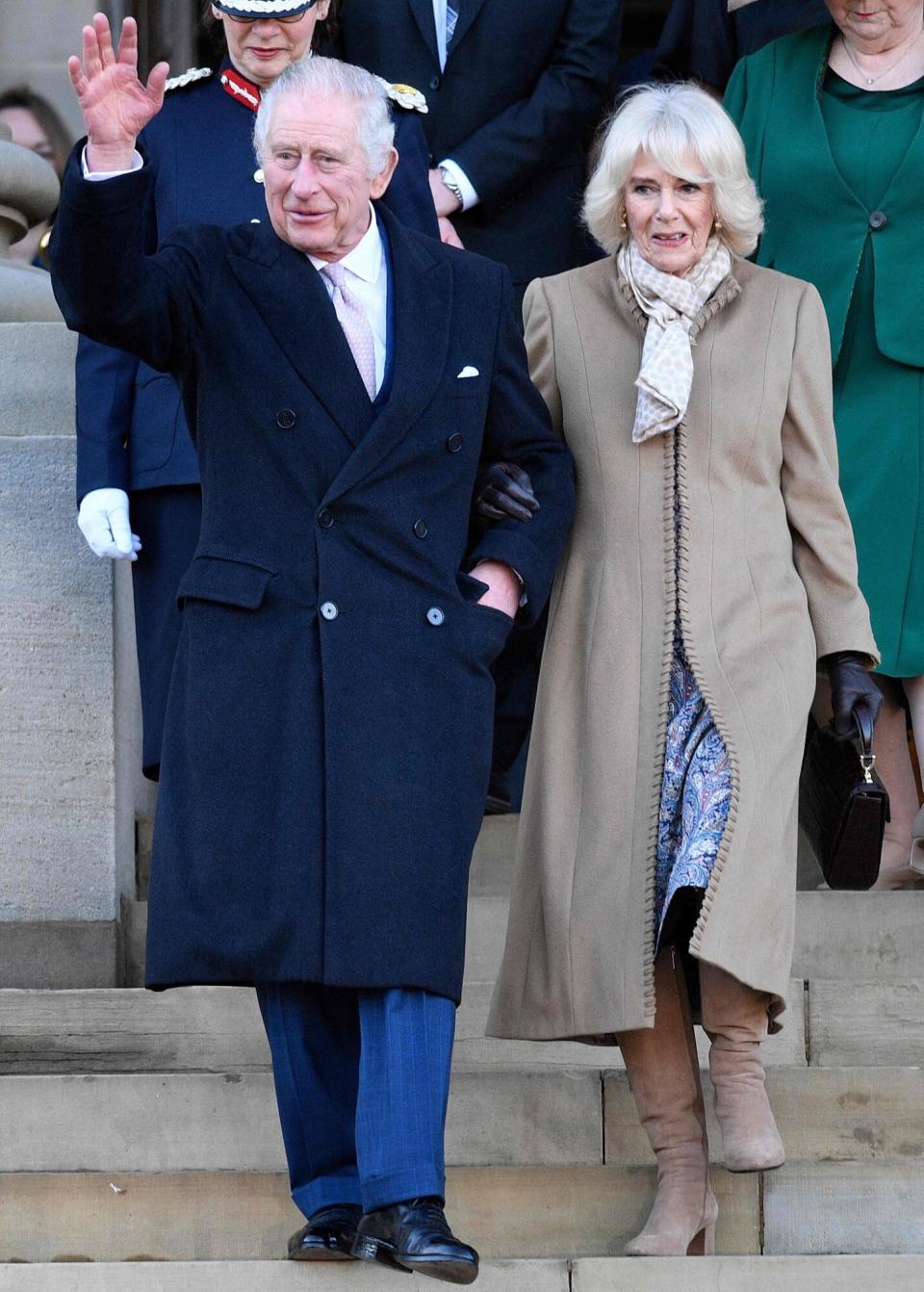 King Charles III and Britain's Camilla, Queen Consort leave after visiting Bolton Town Hall