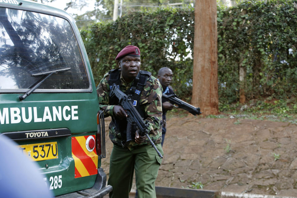 Kenya Security personnel at the scene of an attack on a hotel, in Nairobi, Kenya, Tuesday, Jan. 15, 2019. Extremists launched a deadly attack on a luxury hotel in Kenya's capital Tuesday, sending people fleeing in panic as explosions and heavy gunfire reverberated through the complex. A police officer said he saw bodies, "but there was no time to count the dead." (AP Photo/Brian Inganga)