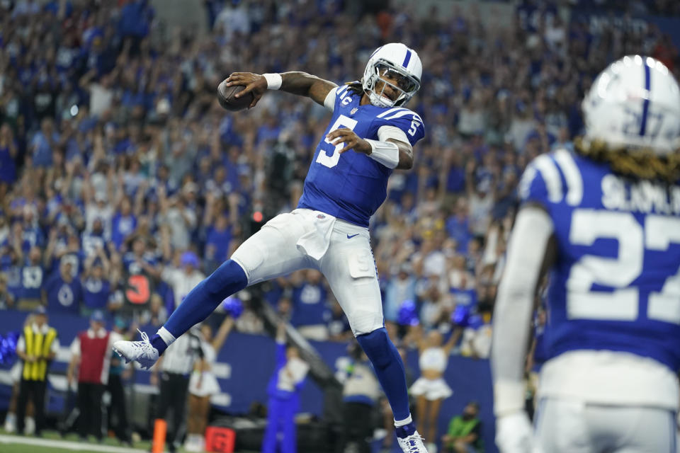 Indianapolis Colts quarterback Anthony Richardson celebrates his touchdown during the second half of an NFL football game against the Los Angeles Rams, Sunday, Oct. 1, 2023, in Indianapolis. (AP Photo/Michael Conroy)