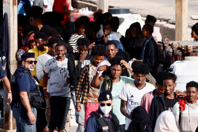 FILE PHOTO: Migrants in Lampedusa