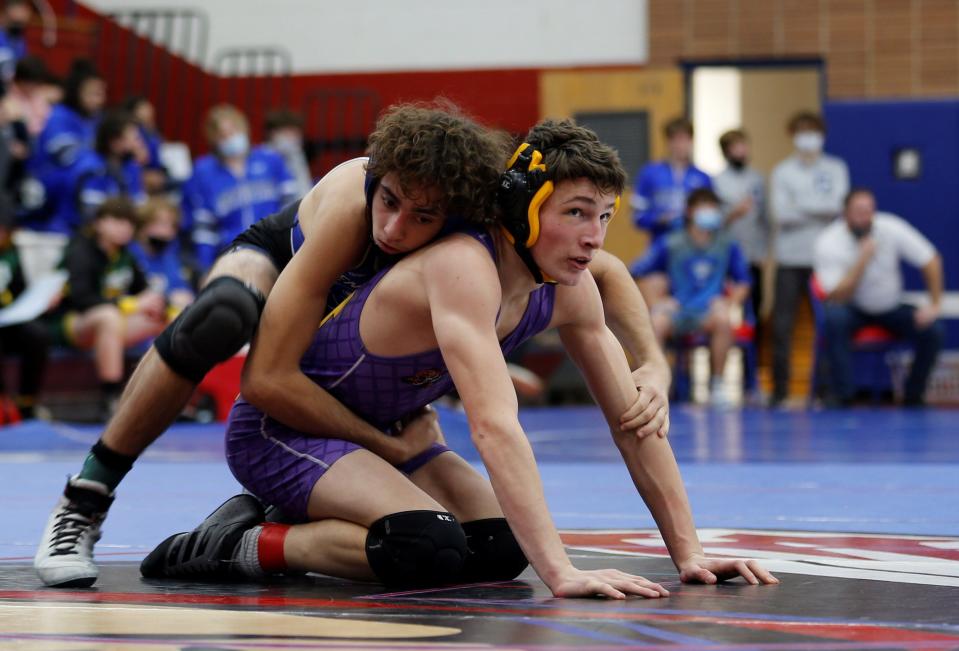 Hagerstown's Zach Golliher and Centerville's Oshea Phillips wrestle in the semifinals of the Tri-Eastern Conference Tournament Jan. 22, 2022.