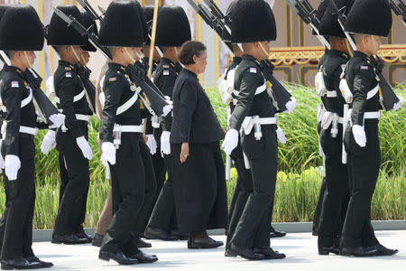 Thailand's Princess Maha Chakri Sirindhorn (C) takes part during a funeral rehearsal for late Thailand's King Bhumibol Adulyadej near the Grand Palace in Bangkok, Thailand October 21, 2017. REUTERS/Athit Perawongmetha
