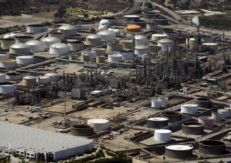 The Phillips 66 oil refinery is viewed from the air in Carson, California August 5, 2015. REUTERS/Mike Blake