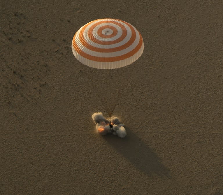 The Soyuz MS-04 spacecraft lands with Expedition 52 Commander Fyodor Yurchikhin of Roscosmos and Flight Engineers Peggy Whitson and Jack Fischer of NASA near the town of Zhezkazgan, Kazakhstan