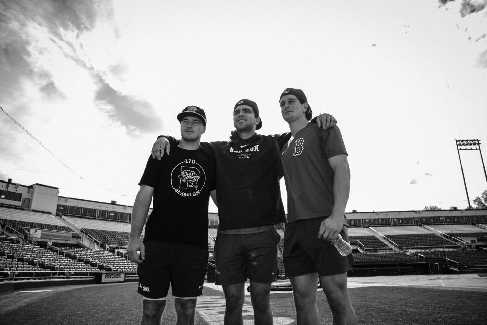 From left, Kyle Teel, Marcelo Mayer and Roman Anthony pose for a photo before a Sea Dogs game at Hadlock Field in Portland, Maine.