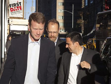 Twitter executives including Adam Messinger (C), chief technology officer of Twitter, arrive at Morgan Stanley as part of the Twitter Roadshow in advance of the firms IPO in New York, October 25, 2013. REUTERS/Carlo Allegri