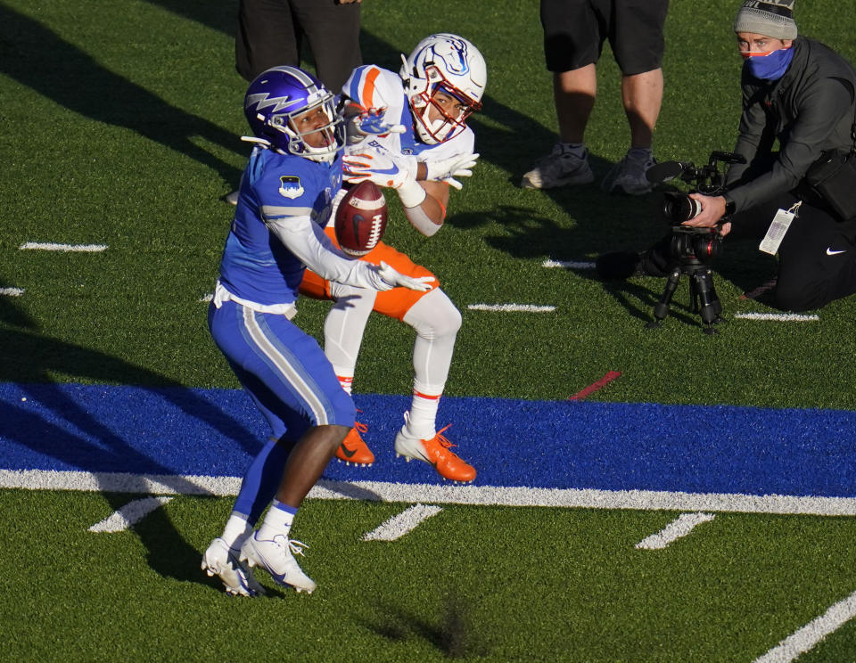Air Force cornerback Elisha Palm, left, blocks a pass intended for Boise State wide receiver Khalil Shakir during the first half of an NCAA college football game Saturday Oct. 31, 2020, at Air Force Academy, Colo. (AP Photo/David Zalubowski)
