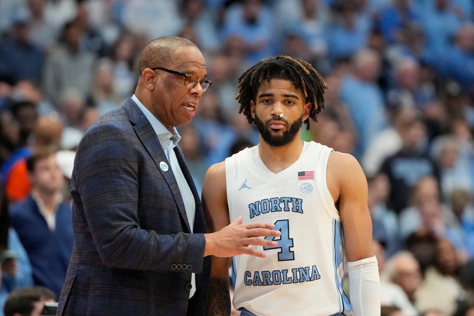 North Carolina head coach Hubert Davis and his team are set to visit the KFC Yum! Center on New Year's Day.