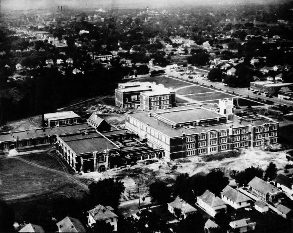 An aerial side view of Wichita High School East around the time it opened in 1923. The school is celebrating its 100th anniversary next month.