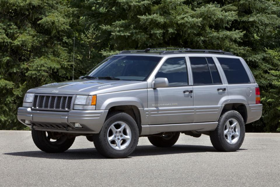 <p>Some people consider the 5.9-liter Grand Cherokee the original high-performance SUV. The Magnum V-8 pushed out 245 horsepower and 345 lb-ft of torque, which were impressive numbers in the '90s. It could get to 60 mph in just 6.8 seconds, making it the quickest SUV you could buy when new. <a href="https://www.ebay.com/itm/323873509861" rel="nofollow noopener" target="_blank" data-ylk="slk:This one;elm:context_link;itc:0;sec:content-canvas" class="link ">This one</a> is for sale right now for under $9000. </p>