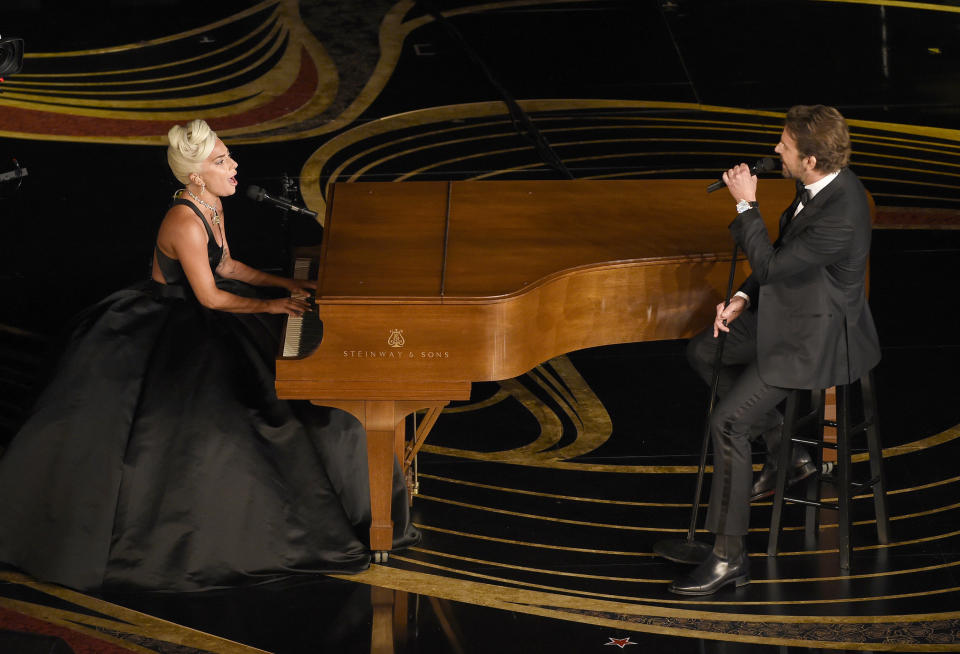 FILE - This Feb. 24, 2019 file photo shows Lady Gaga, left, and Bradley Cooper performing "Shallow" from "A Star is Born" at the Oscars in Los Angeles. (Photo by Chris Pizzello/Invision/AP, File)