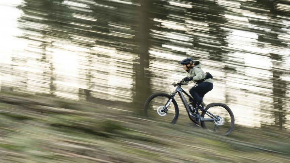 Canyon Neuron:ONfly lightweight 140mm carbon trail ebike with Bosch SX motor, climbing pan shot