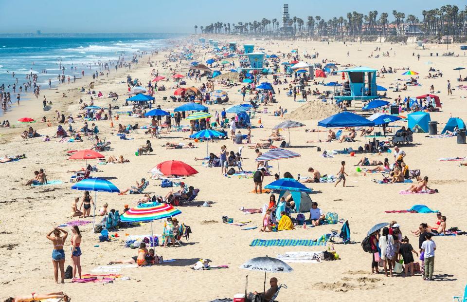 Summer weather warms Southern California as thousands make their way to the beach