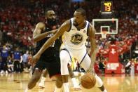 May 14, 2018; Houston, TX, USA; Golden State Warriors forward Kevin Durant (35) dribbles against Houston Rockets guard James Harden (13) during the fourth quarter in game one of the Western conference finals of the 2018 NBA Playoffs at Toyota Center. Mandatory Credit: Troy Taormina-USA TODAY Sports