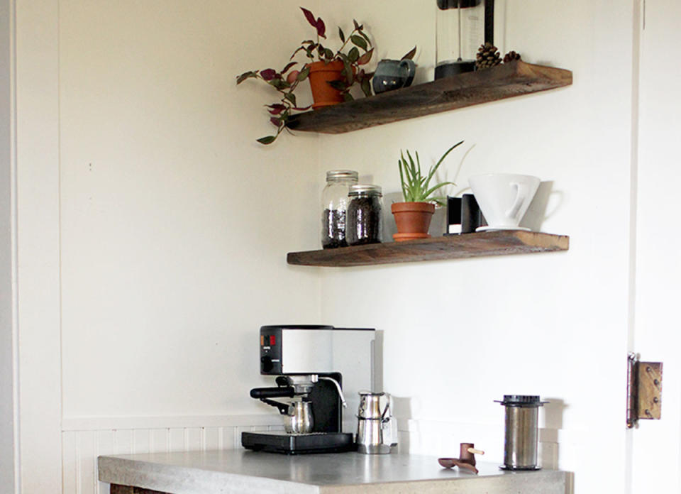 <body> <p>Calling all coffee lovers! If the gadgets you need to make your morning cup of joe are taking up too much <a rel="nofollow noopener" href=" http://www.bobvila.com/slideshow/spreading-out-14-ways-to-get-more-counter-space-47332?#.V7yEcJMrLBI?bv=yahoo" target="_blank" data-ylk="slk:counter space;elm:context_link;itc:0;sec:content-canvas" class="link ">counter space</a>, turn a small corner of your kitchen into your very own cafe. Create a counter using a small table you already have on hand, or build your own with wood for the base and concrete for the top. Then add a few floating shelves to stash your favorite beans and mugs.</p> <p><strong>Related: <a rel="nofollow noopener" href=" http://www.bobvila.com/slideshow/21-coffee-bars-to-put-pep-in-your-home-design-46983?#.V7yErJMrLBI?bv=yahoo" target="_blank" data-ylk="slk:21 Coffee Bars to Put Pep in Your Home Design;elm:context_link;itc:0;sec:content-canvas" class="link ">21 Coffee Bars to Put Pep in Your Home Design</a> </strong> </p> </body>