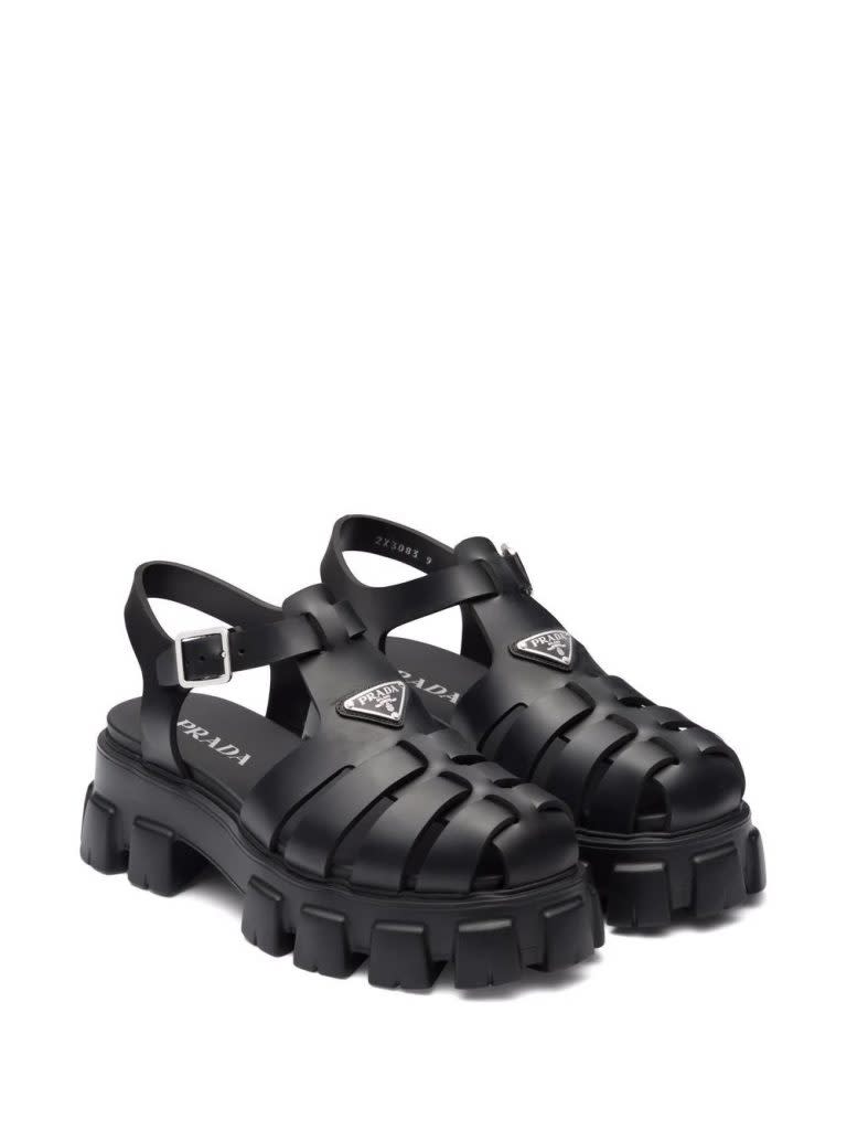 Prada triangle-logo fisherman sandals (HK$4,561)。