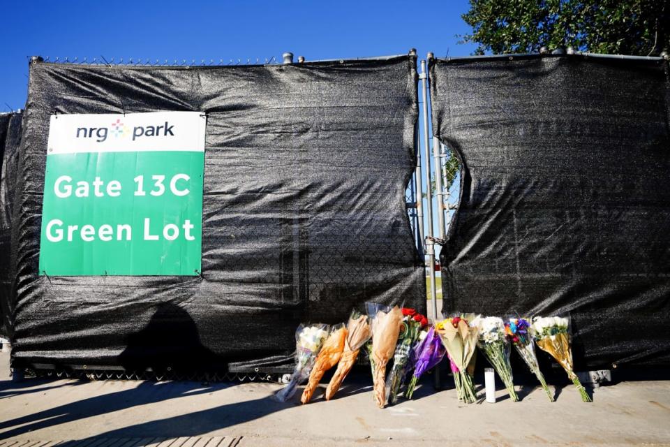 <div class="inline-image__caption"><p>Flowers are left outside of the canceled Astroworld festival at NRG Park.</p></div> <div class="inline-image__credit">Alex Bierens de Haan/Getty</div>