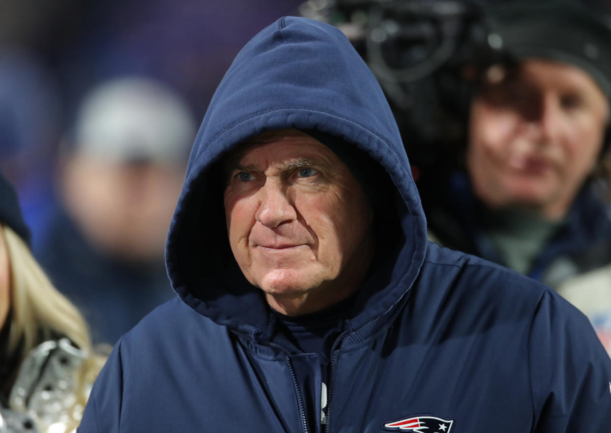 Footage of a candid Bill Belichick shows him cheering on his defense during Sunday’s win over the Packers. (Getty)