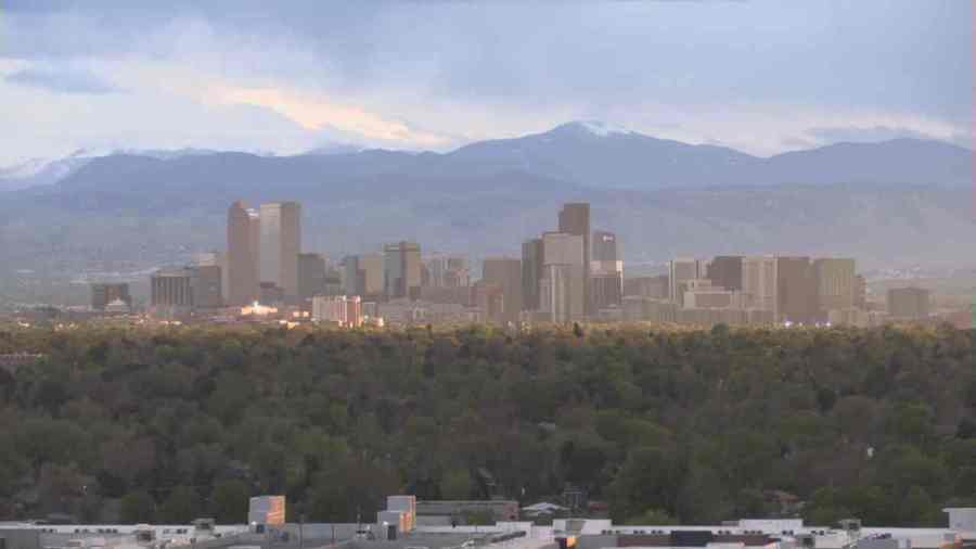 Denver skyline seen from Central Park at sunset on May 12, 2024.