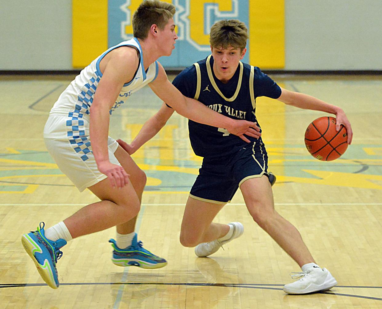 Sioux Valley's Maxwell Engebretson makes a move against Hamlin's Jackson Wadsworth during their high school boys basketball game on Monday, Feb. 5, 2024 at the Hamlin Education Center. No. 2 Hamlin topped No. 4 Sioux Valley 80-48 in a battle of rated Class A teams.