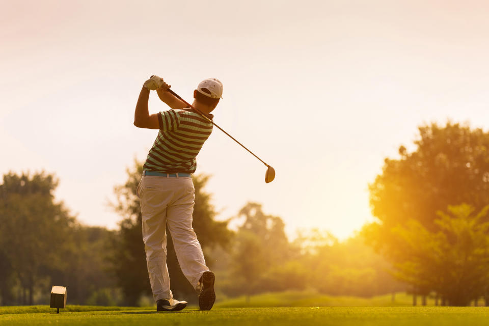 Man playing golf