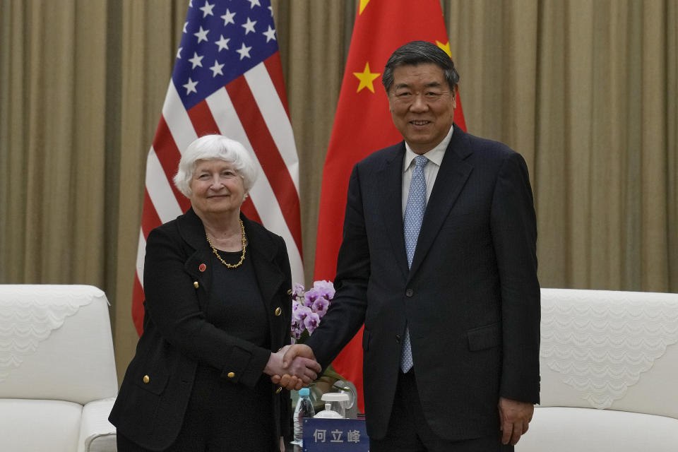 U.S. Treasury Secretary Janet Yellen, left, shakes hands with Chinese Vice Premier He Lifeng as they arrive for a one-to-one meeting at the Guangdong Zhudao Guest House in southern China's Guangdong province, Saturday, April 6, 2024. (AP Photo/Andy Wong, Pool)