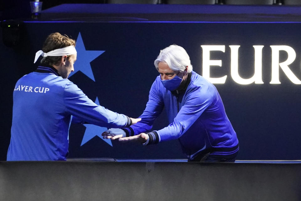 Europe's captain Bjorn Borg, right, greets Casper Ruud, of Norway, prior to his match at Laver Cup tennis, Friday, Sept. 24, 2021, in Boston. (AP Photo/Elise Amendola)