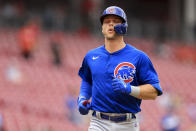 Chicago Cubs' Nico Hoerner crosses home plate after hitting a solo home run during the second inning of a baseball game against the Cincinnati Reds in Cincinnati, Thursday, May 26, 2022. (AP Photo/Aaron Doster)