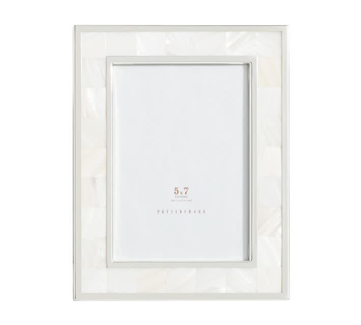 <p><a href="https://go.redirectingat.com?id=74968X1596630&url=https%3A%2F%2Fwww.potterybarn.com%2Fproducts%2Fmother-of-pearl-frames&sref=https%3A%2F%2Fwww.cosmopolitan.com%2Fstyle-beauty%2Ffashion%2Fg44109754%2Fbest-12-year-anniversary-gifts%2F" rel="nofollow noopener" target="_blank" data-ylk="slk:Shop Now;elm:context_link;itc:0;sec:content-canvas" class="link ">Shop Now</a></p><p>Mother-of-Pearl Frame</p><p>$59.00</p><p>potterybarn.com</p>