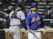 New York Mets' Andrew Brown reacts after striking out during the seventh inning of a baseball game against the Atlanta Braves, Friday, April 18, 2014, in New York. (AP Photo/Frank Franklin II)