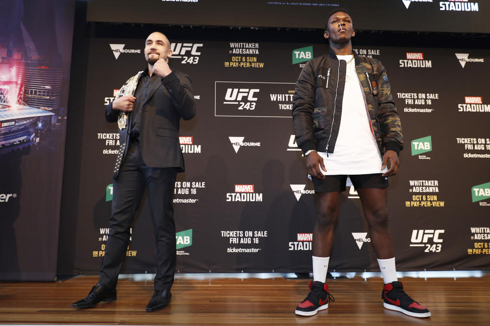 MELBOURNE, AUSTRALIA - AUGUST 15: Robert Whittaker (L) and Israel Adesanya (R) pose during a UFC Australia press conference at Federation Square on August 15, 2019 in Melbourne, Australia. (Photo by Daniel Pockett/Zuffa LLC/Zuffa LLC via Getty Images)