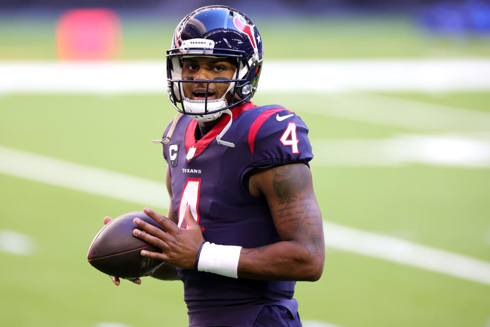 HOUSTON, TEXAS - JANUARY 03: Deshaun Watson #4 of the Houston Texans in action against the Tennessee Titans during a game at NRG Stadium on January 03, 2021 in Houston, Texas. (Photo by Carmen Mandato/Getty Images)