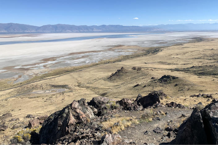 Water levels on the Great Salt Lake have retreated away from what was once the shoreline, leaving acres of exposed playa. The crusty lake bed surface, seen here from Antelope Island, is breaking down in some areas and blowing away. The playa is a source of dust that could worsen air pollution. (Evan Bush / NBC News)