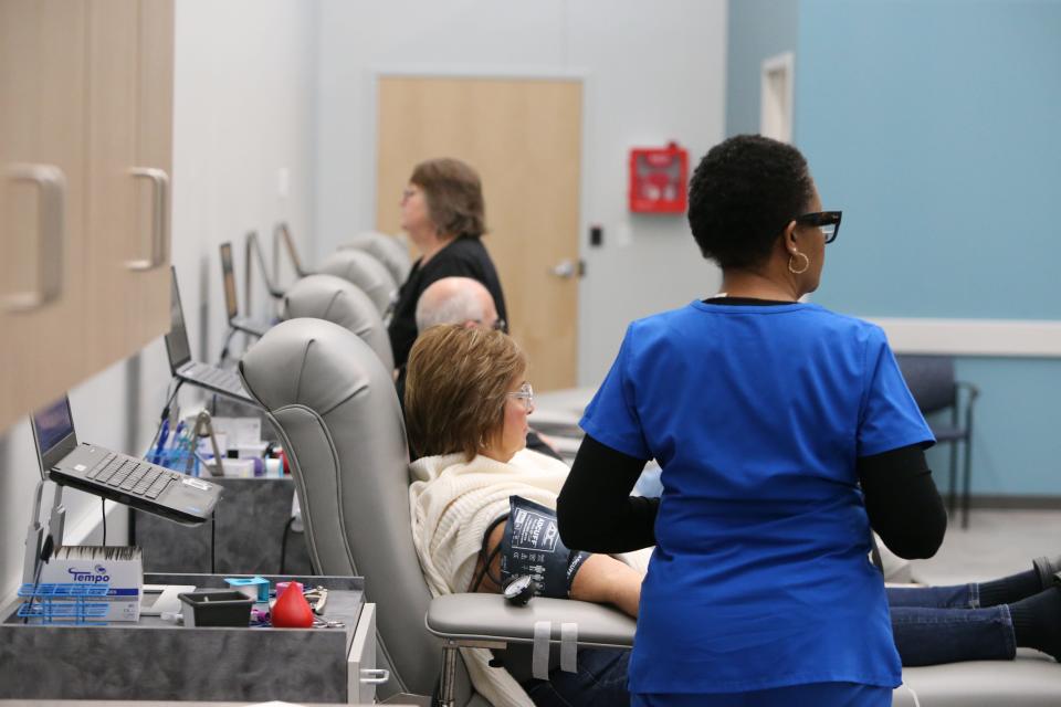 Two blood donors are cared for by phlebotomists Wednesday, Jan. 3, 2024, at the South Bend Medical Foundation Blood Center at 3355 Douglas Road in South Bend.