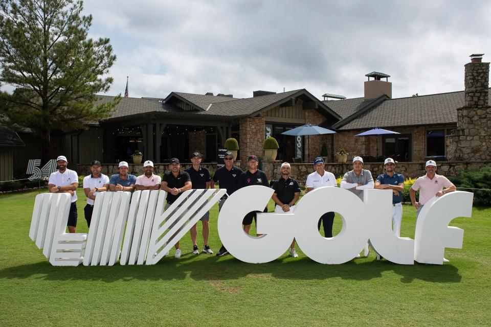 Golfers pose before the second round of LIV Golf Tulsa at the Cedar Ridge Country Club on May 13.