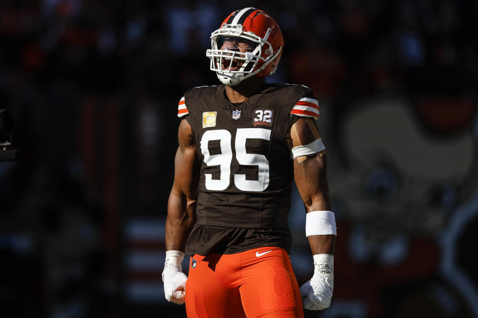 Cleveland Browns defensive end Myles Garrett (95) celebrates his sack on Pittsburgh Steelers quarterback Kenny Pickett during the first half of an NFL football game, Sunday, Nov. 19, 2023, in Cleveland. (AP Photo/Ron Schwane)