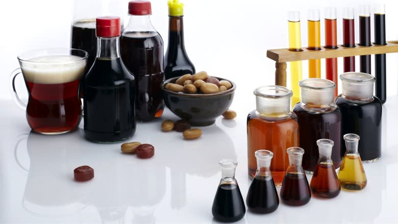 Soy sauce bottles and vials of caramel coloring