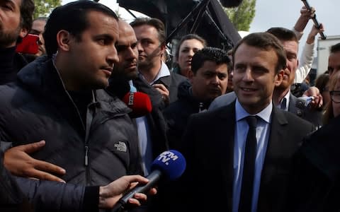 Mr Benalla (left) became a senior aid to Mr Macron - Credit: AP Photo/Thibault Camus, File