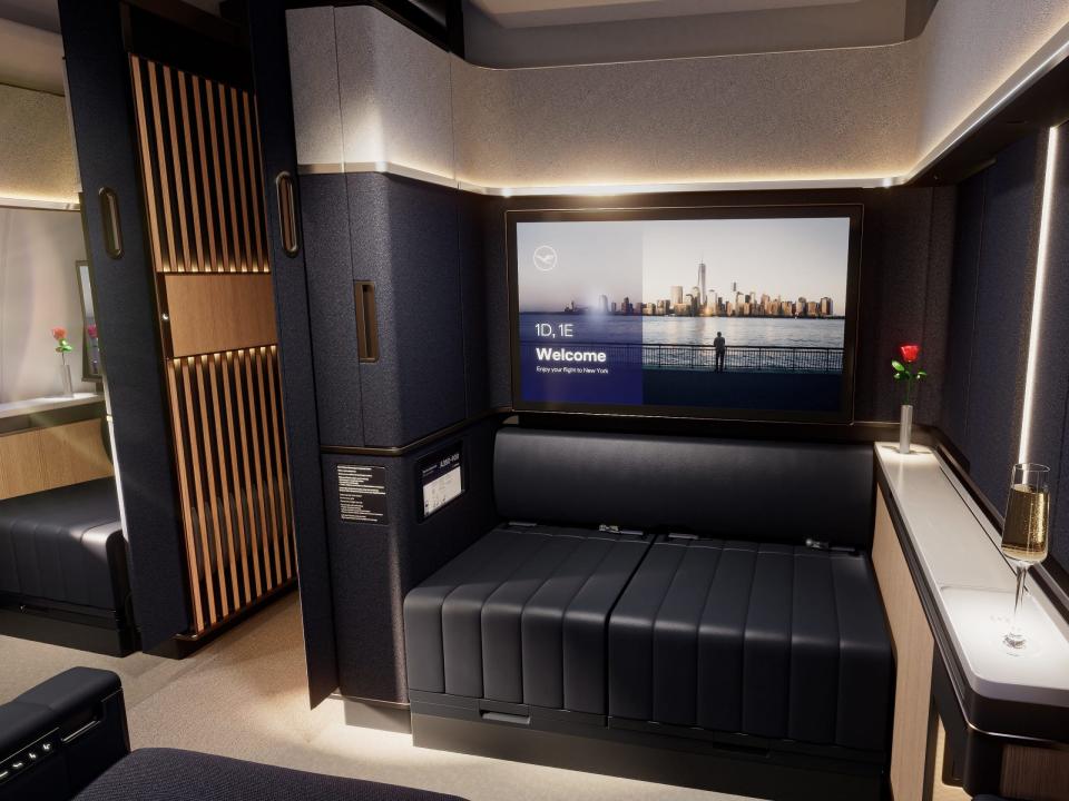 Lufthansa new Allegris first-class suites: Interior photo showing the seating and a large TV screen