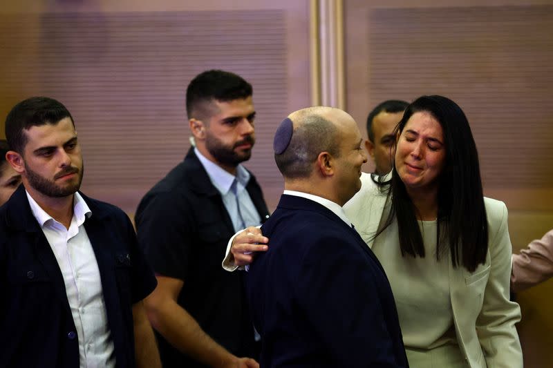 Israeli Prime Minister Naftali Bennett delivers a statement to the media, telling reporters he will not be running in Israel’s next election, at the Knesset, the Israeli Parliament, in Jerusalem