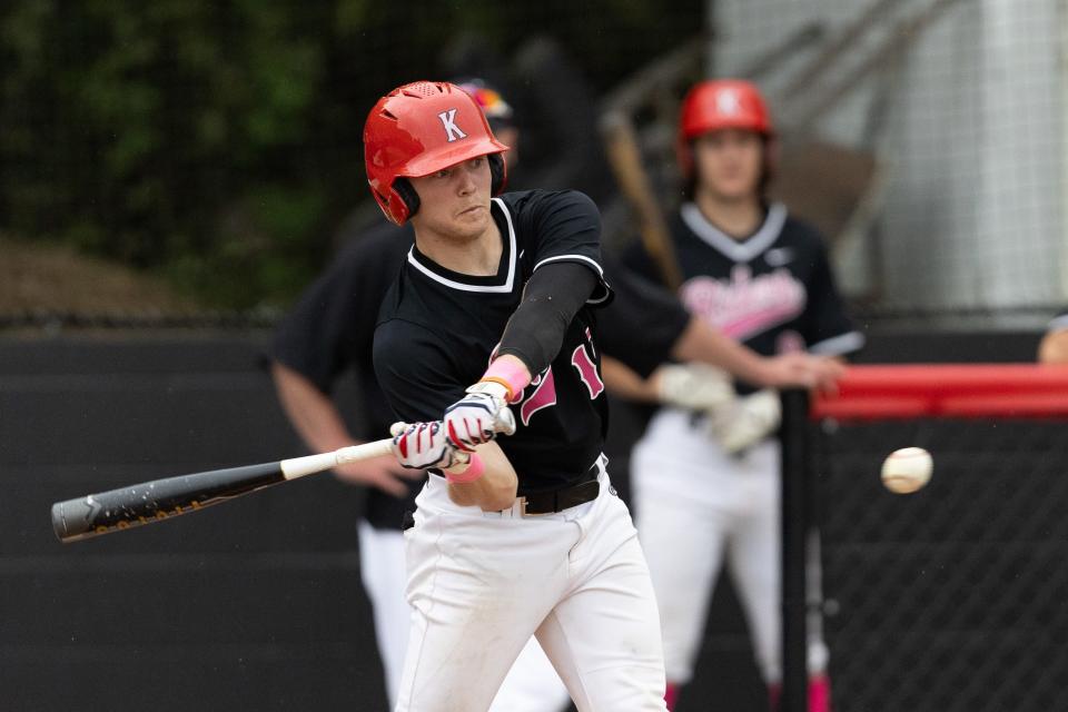 Kent Roosevelt’s Jack Smith hits the ball during Friday’s game against the Ravenna Ravens in Kent, OH.