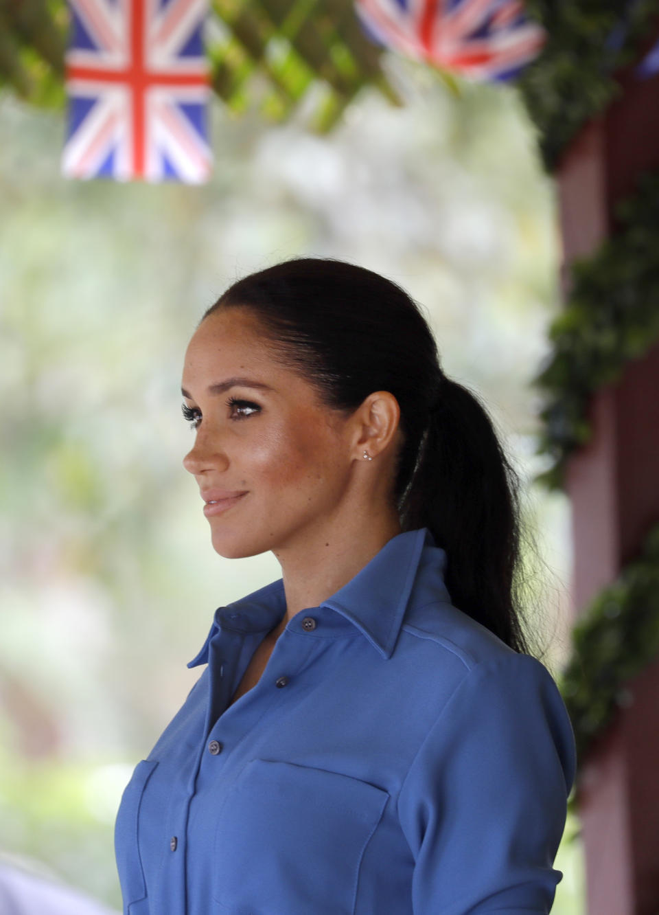 Meghan, Duchess of Sussex smiles during a visit to Tupou College in Tonga, Friday, Oct. 26, 2018. Prince Harry and his wife Meghan are on day 11 of their 16-day tour of Australia and the South Pacific. (AP Photo/Kirsty Wigglesworth, Pool)