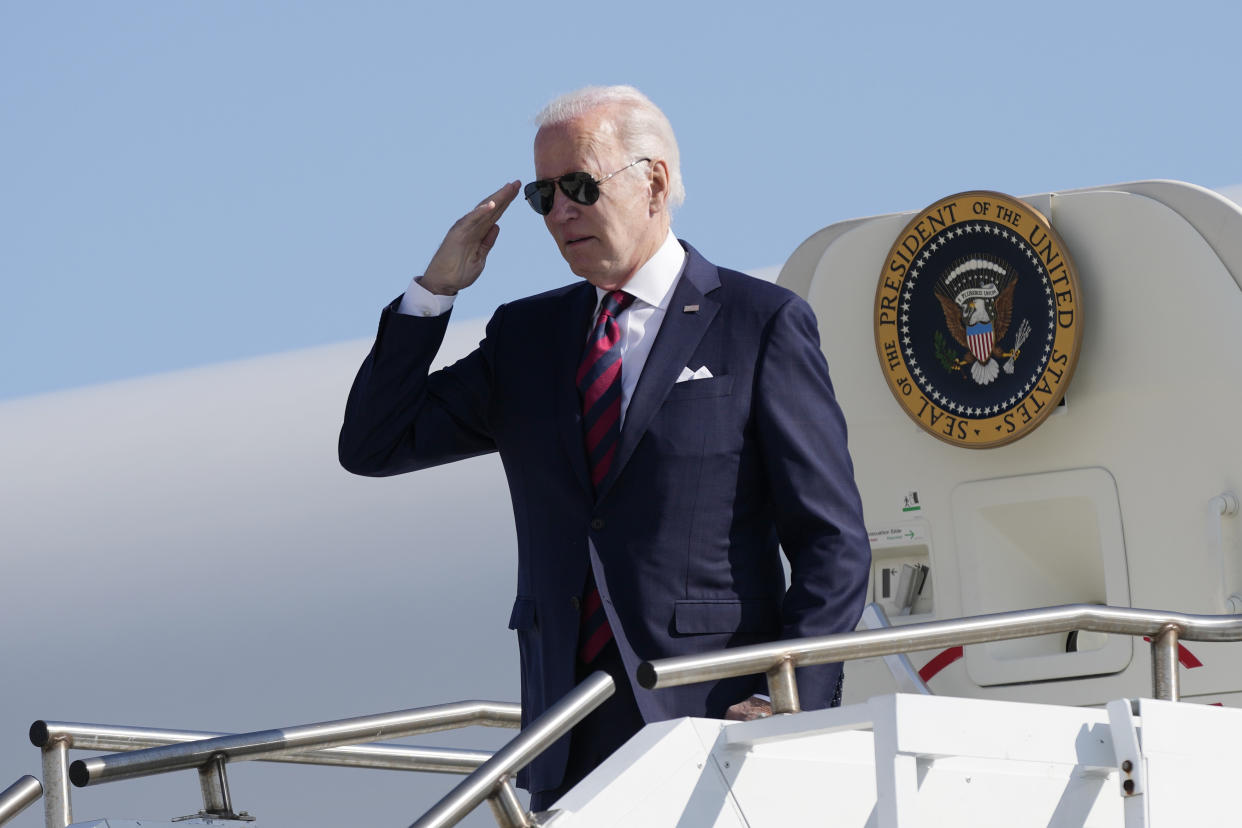 FTSE President Joe Biden salutes as he boards Air Force One at Dover Air Force Base in Dover, Del., Monday, May 15, 2023. The Biden's are traveling to Philadelphia. (AP Photo/Patrick Semansky)