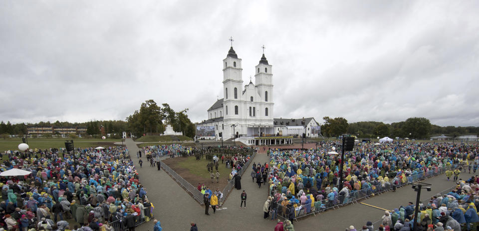 Faithful gather as they wait for Pope Francis to arrive to celebrate a Holy Mass at the Shrine of the Mother of God, in Aglona, Latvia, Monday, Sept. 24, 2018. Francis is visiting Lithuania, Latvia and Estonia to mark their 100th anniversaries of independence and to encourage the faith in the Baltics, which saw five decades of Soviet-imposed religious repression and state-sponsored atheism. (AP Photo/Mindaugas Kulbis)