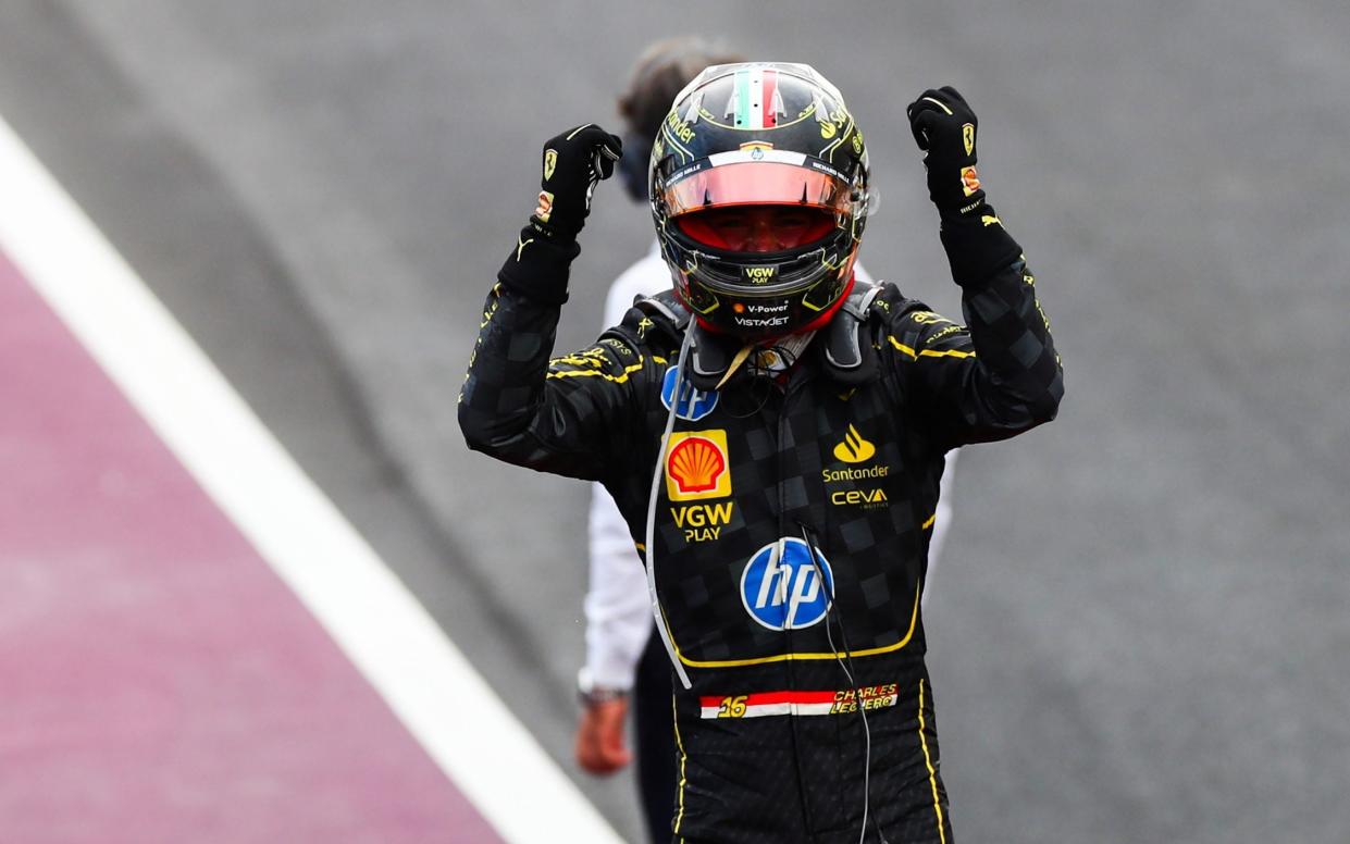 Charles Leclerc celebrates winning the Italian Grand Prix